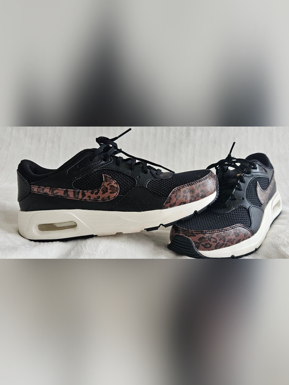 Nike Women's Black Sneakers with Brown Leopard Accents